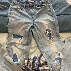 distressed light blue jeans
